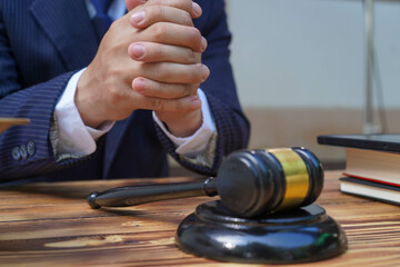 Male lawyer working with contract documents and Justice and law, lawyer, court judge, concept.