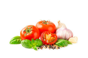 Fresh cherry tomatoes and fresh green basil isolated on white background. Tomato sauce. Vegan. Ingredients for salad. Organic food. Place for text. Copy space.