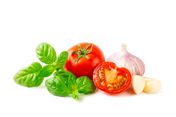 Fresh cherry tomatoes and fresh green basil isolated on white background. Tomato sauce. Vegan. Ingredients for salad. Organic food. Place for text. Copy space.