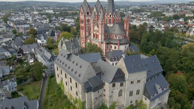 Aerial view of castle, church, and cathedral in autumn by the river Lahn, Limburg an der Lahn, Germany.