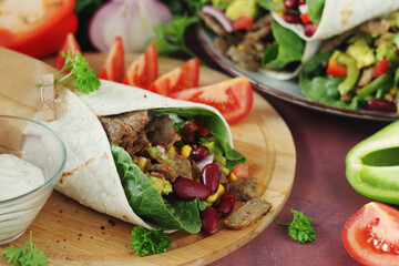 Burrito - typical Texas and Mexican cuisine wrap dish	