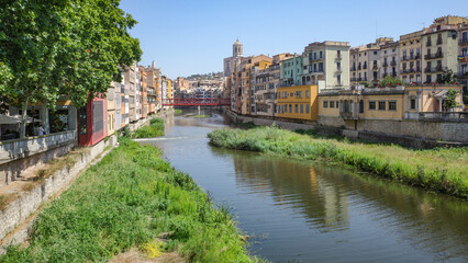 Girona, Spain - 18 July, 2024: Colorful buildings along the River Onyar, Girona, Catalonia