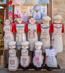 Local models of traditional and typical Sardinian chefs costume displayed for sale, Alghero, Sardinia, Italy