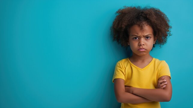 Portrait of a grumpy young black girl 
