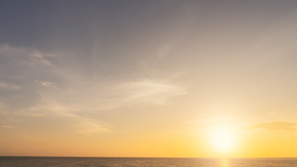 sunset sky over sea in the evening