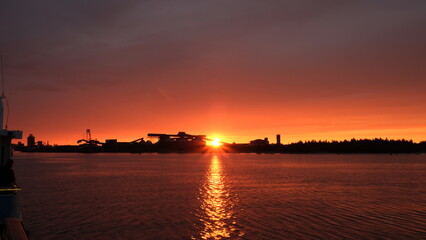 Fototapeta premium view of Luleå at sunset, industrial area
