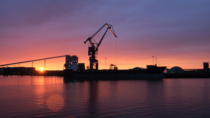 Fototapeta premium view of Luleå at sunset, industrial area