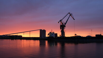 Fototapeta premium view of Luleå at sunset, industrial area