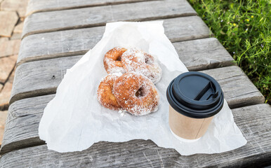 picnic with donuts and a glass of coffee