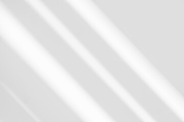 Abstract light reflection and grey shadow from window on white wall background. Gray stripe window...
