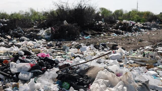 Trash issue, Garbage piles, Overwhelming heap. Prevalence trash on extensive land areas illustrates distressing disregard for environment, pointing urgent need reform waste processing.