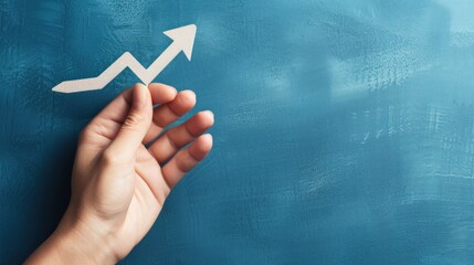 hand holding a graph