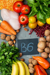 An example of a range of products containing vitamin B6. The concept of proper balanced nutrition. Products with the inscription B6 on a dark background, top view..