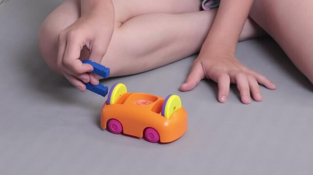 Teenage girl conducts an experience with magnet. Science and education. Tools for learning. 