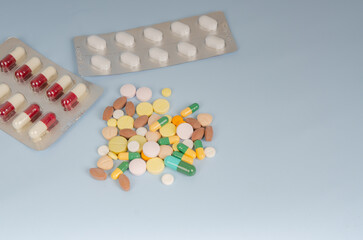 Medical pills in blisters. Lots of pills. Top view. The texture is made of medicinal preparations.