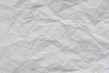 Naklejka premium Crumpled white paper texture. Old sheet of paper with cracks
