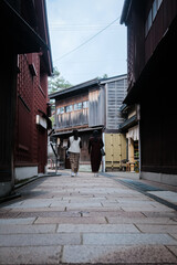 Two women walking in the street of Kanazawa, Japan