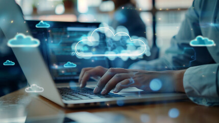 Hands typing on laptop with cloud computing technology icons overlayed, representing modern data management and digital transformation.
