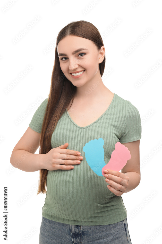 Poster Expecting twins. Pregnant woman holding two paper cutouts of feet on white background