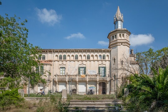 An old modernist farmhouse of stately type isolated with a decoration inspired by the civil gothic.Mas Cal Pla in mountains of the town of Cunit (Tarragona)