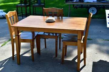 Wooden Table and Chairs at a Yard Sale