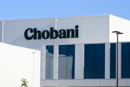 Twin Falls, ID, USA - June 23, 2024; Black text sign on white wall at Chobani manufacturing facility