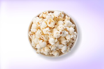 Flying tasty fresh salt popcorn on background