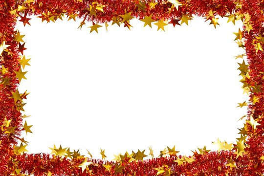 Festive Christmas frame, border. Bright red fluffy tinsel with golden stars as a frame. Garlands isolated on white background. Flat lay, top view, copy space. Overlay background.