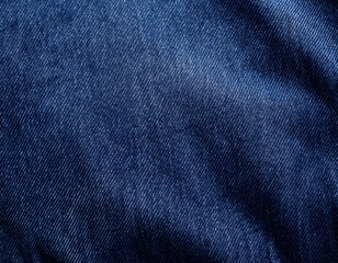 Deep Navy Blue Denim Fabric Texture with a Smooth, Worn Surface for Sophisticated Backgrounds