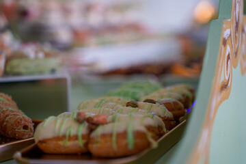 Candy bar at a wedding. Delicious desserts. Beautiful decorations. Fruits. Sweet cakes on your holiday. Birthday. Sweet life. interior photo.