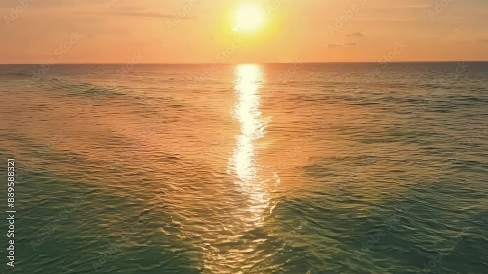 Poster The suns reflection on the calm waters of the ocean creates a dazzling display of light and color a true feast for the eyes.