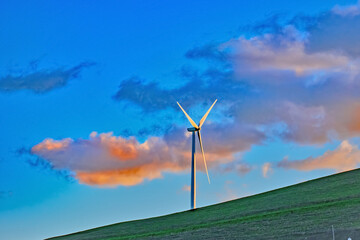 Fototapeta premium Windmill and Beautiful Clouds in the Background 