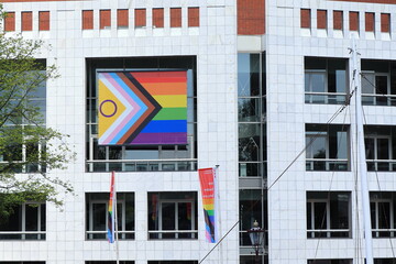 Naklejka premium Amsterdam City Hall Facade Close Up with Progress Pride Flag, Netherlands