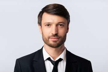 ID Photo. Portrait Of Businessman In Suit Looking Friendly At Camera Over White Background. Studio Shot, Isolated