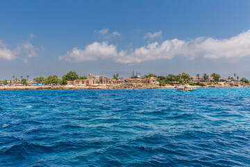 Naklejka premium View from the sea to the historic town of Side and ruins of Apollo temple in Turkey