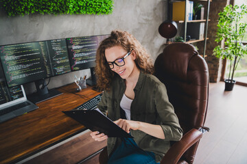 Photo of lovely confident successful woman software developer sitting armchair comfortable...