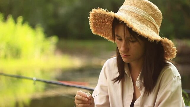 woman to bait corn the hook close up