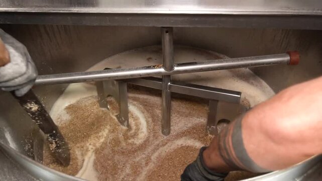 Craft Beer Brewing: Person Crafting Artisan Beer - High-Quality Brewery