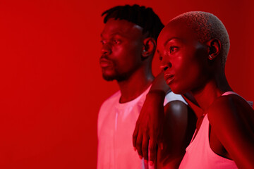 Woman, man and thinking with red lighting for fitness, together and pride for teamwork. People, personal trainer and memory for workout, exercise and health or wellness by studio background or mockup