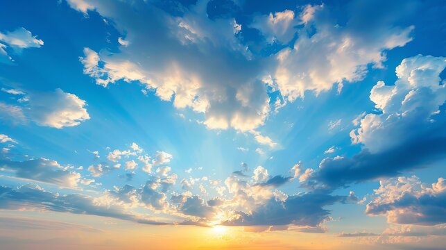 Sunset with a blue sky and some clouds Blue sky with summer clouds and a sunset scene