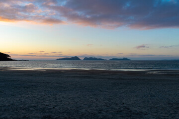 Patos beach in Nigran at sunset with the Cies Islands in the background