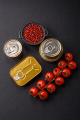 Metal can with canned meat or fish with a key to open it