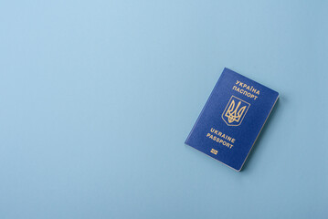 Biometric Ukrainian passport on a blue background
