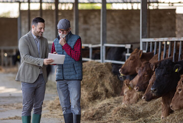 Farmer and businessman talking about contract