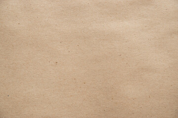 Brown paper texture closeup as background. Vintage paper sheet for design and decoration.