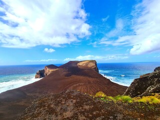 The Capelinhos Volcano is a volcano located on the island of Faial in the Azores, Portugal. It erupted in 1957 and continued to erupt for over a year, causing significant damage.