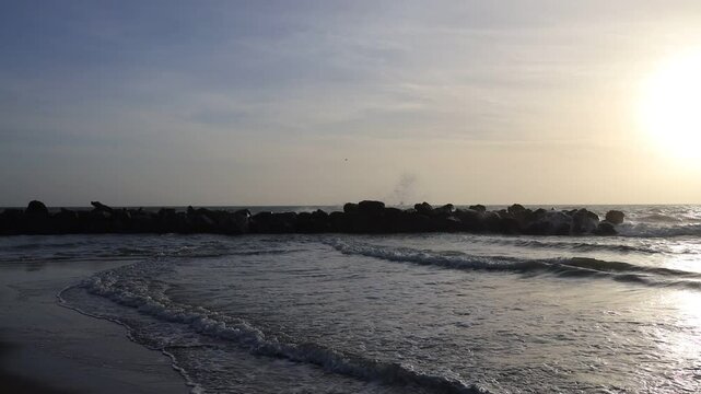 Waves on a rocky beach. Ocean coastline. Stop motion moving image clip mp4.Waves on a rocky beach. Ocean coastline. Stop motion moving image clip mp4. Santa Severa, Italy - Italia