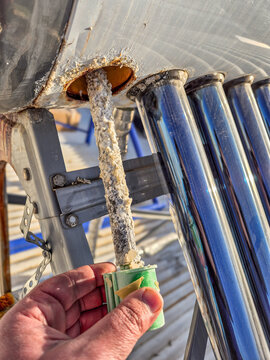 Sacrificial anode in solar hot water tank.