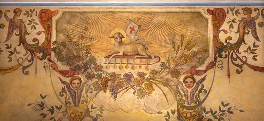 PERUGIA, ITALY - MAY 16, 2024: The fresco of Lamb of God among the floral motives in the church...