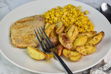 seasoned boneless pork chop  with  corn